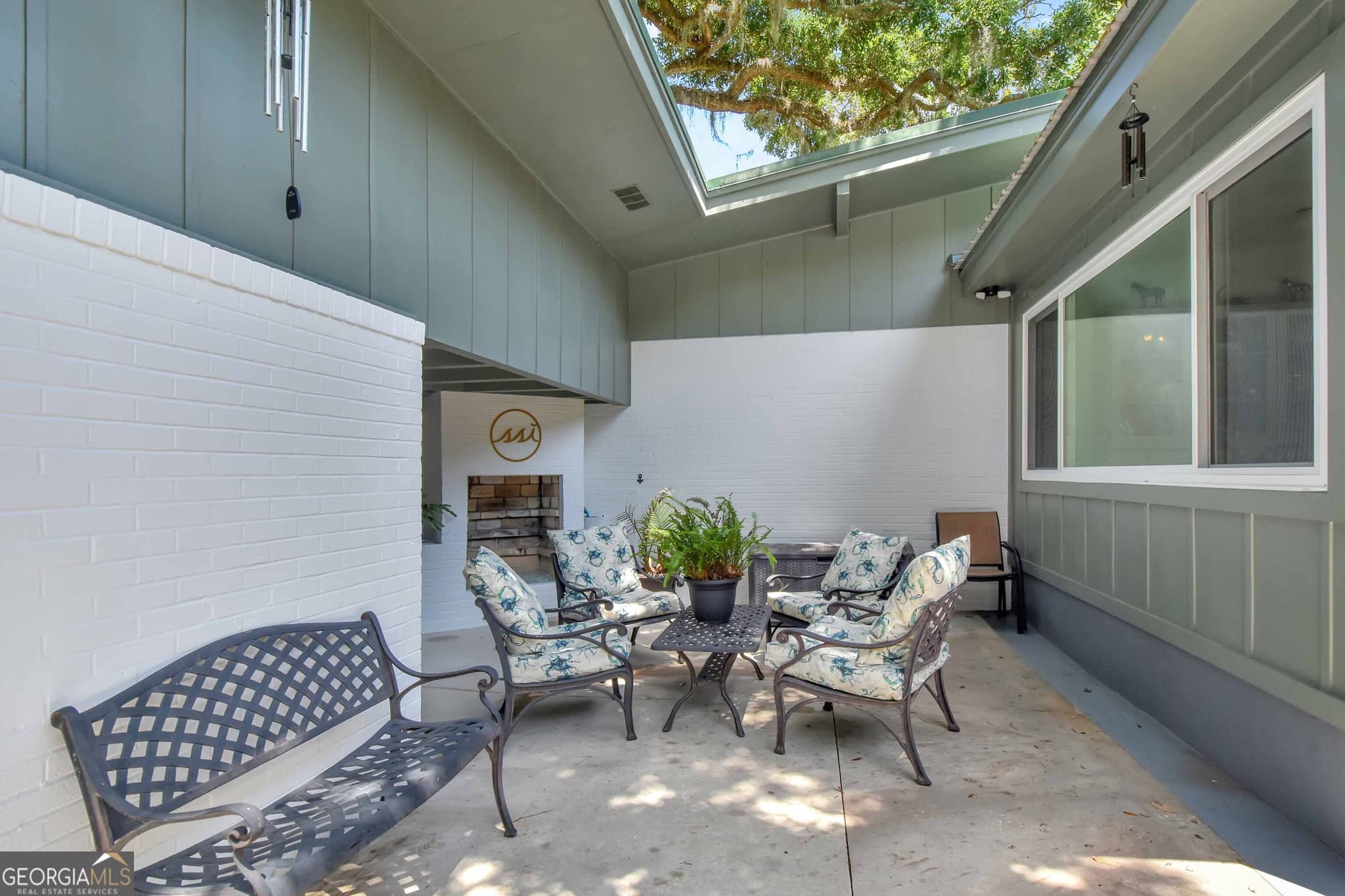 4 bedroom, 3 bathroom, 2,477 sq ft single family residence for sale at 101 Druid Oaks Lane, St. Simons, GA 31522 — photo 4