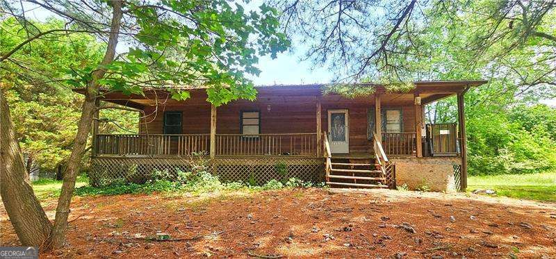 5 bedroom, 2.5 bathroom, 1,125 sq ft cabin,single family residence sold at 496 Blalock Road, Adairsville, GA 30103