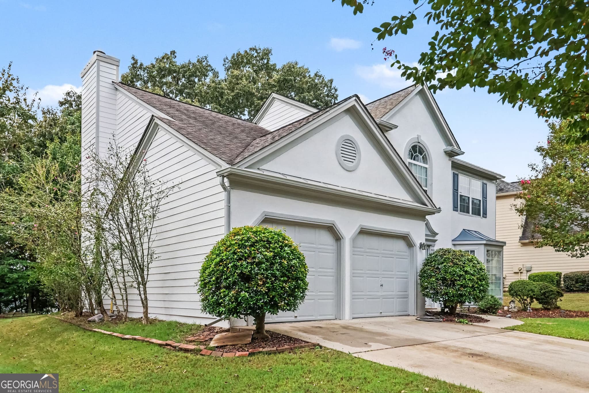 4 bedroom, 2.5 bathroom, 2,378 sq ft single family residence for sale at 5905 Haterleigh Drive, Johns Creek, GA 30005 — photo 3