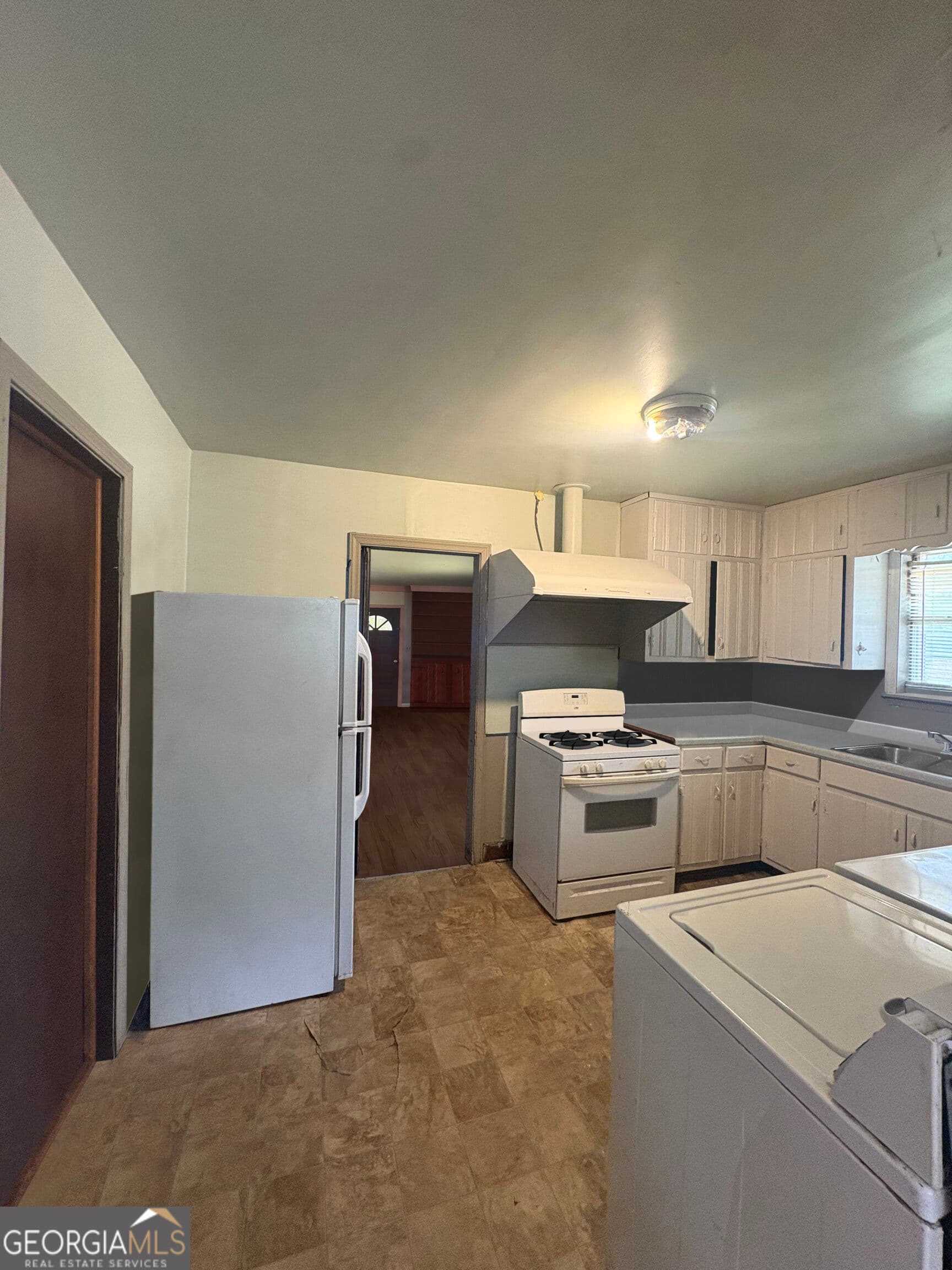 5 bedroom, 2 bathroom single family residence for sale at 1957 Valencia Road, Decatur, GA 30032 — photo 7