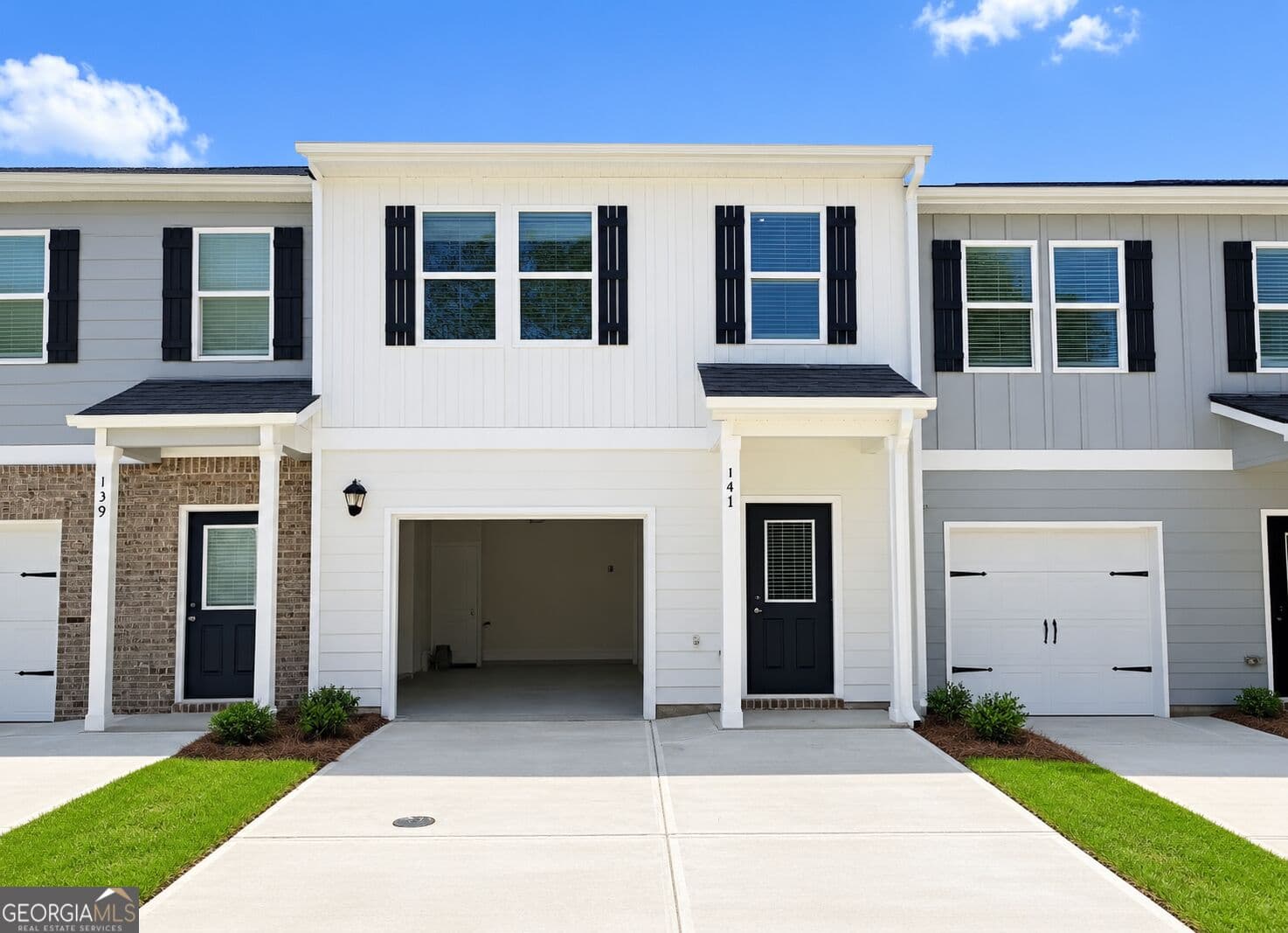 3 bedroom, 2.5 bathroom, 1,538 sq ft townhouse for sale at 141 Village Green Drive, Adairsville, GA 30103 — photo 1 of 12