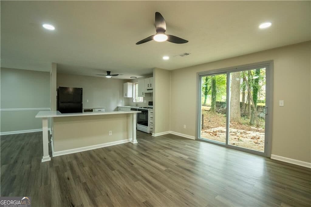 4 bedroom, 3 bathroom, 1,272 sq ft single family residence for sale at 1995 Northerly Way, Stone Mountain, GA 30088 — photo 4