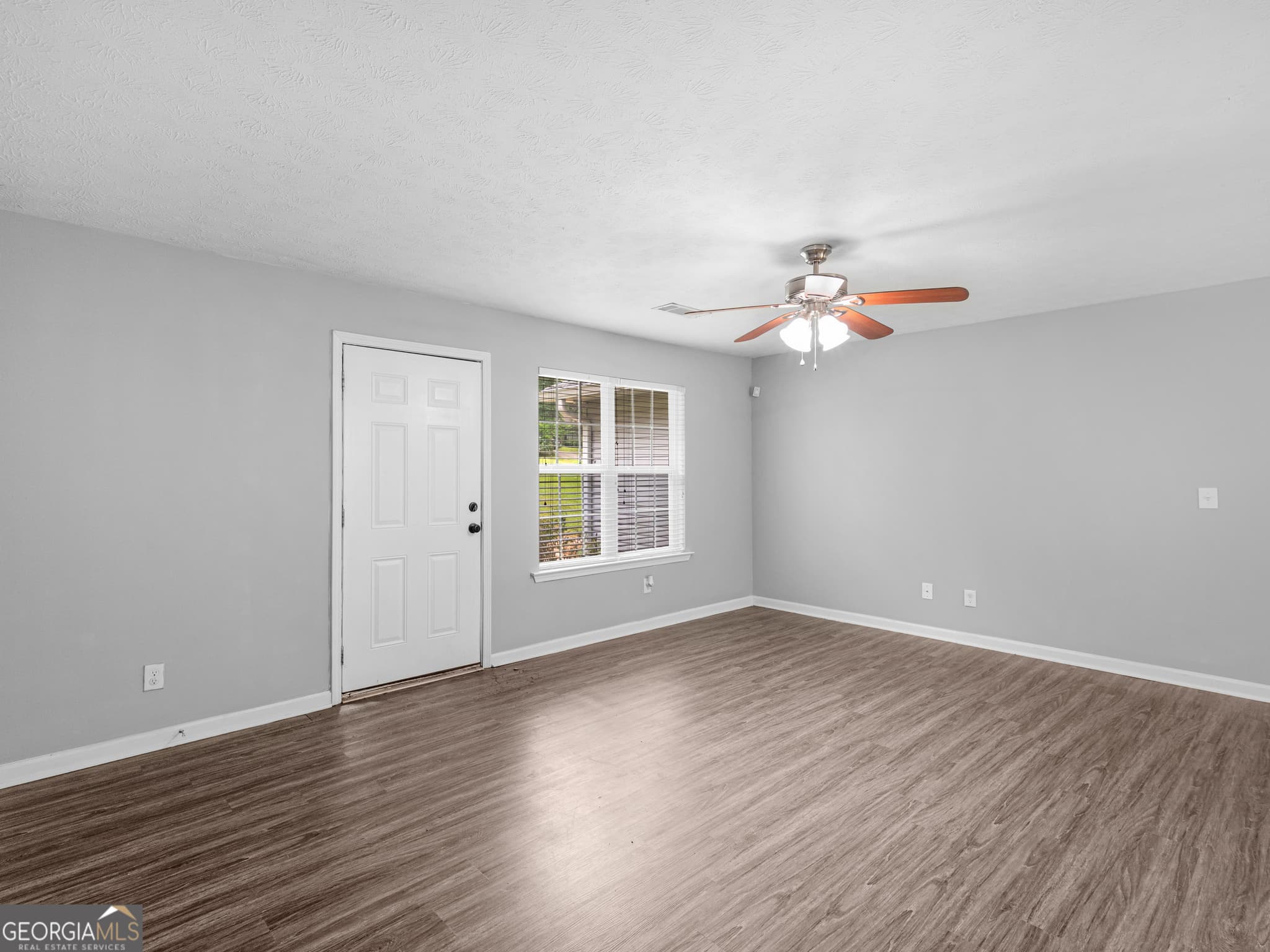 3 bedroom, 2 bathroom, 1,476 sq ft single family residence for sale at 122 Springwood Valley Road, Stockbridge, GA 30281 — photo 3