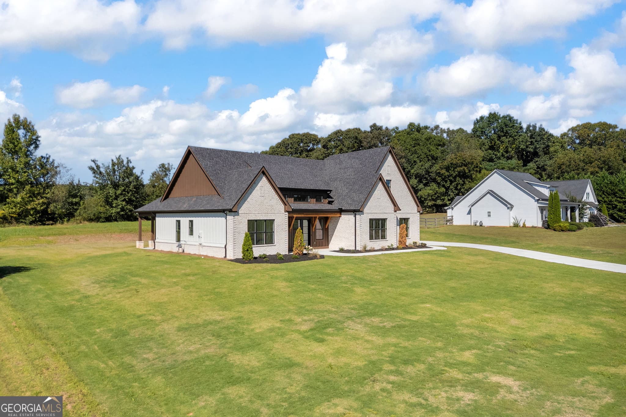 4 bedroom, 3 bathroom, 2,840 sq ft single family residence for sale at 5340 Noah Road, Cumming, GA 30041 — photo 2