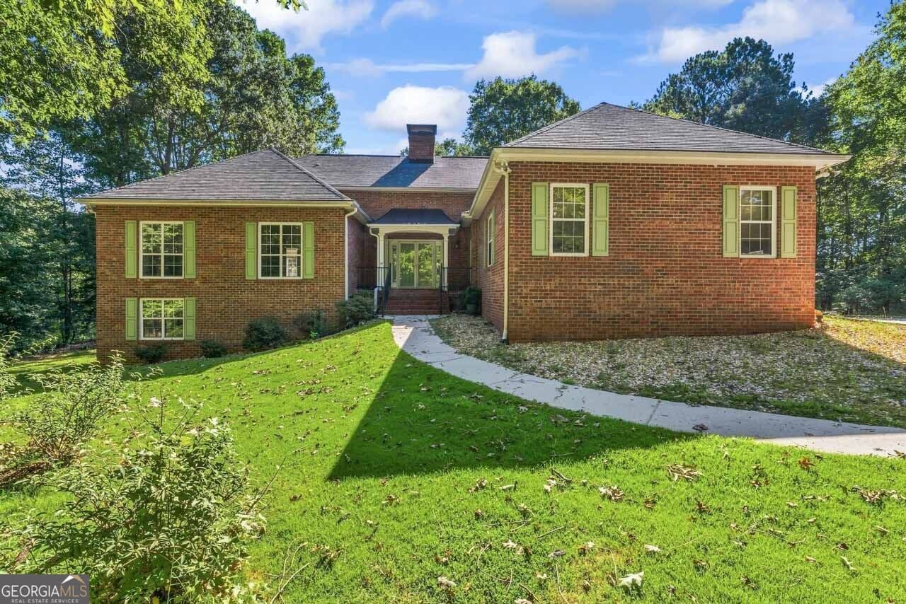 4 bedroom, 3 bathroom, 2,640 sq ft single family residence for sale at 2522 Chimney Ridge Drive, Conyers, GA 30094 — photo 1 of 57