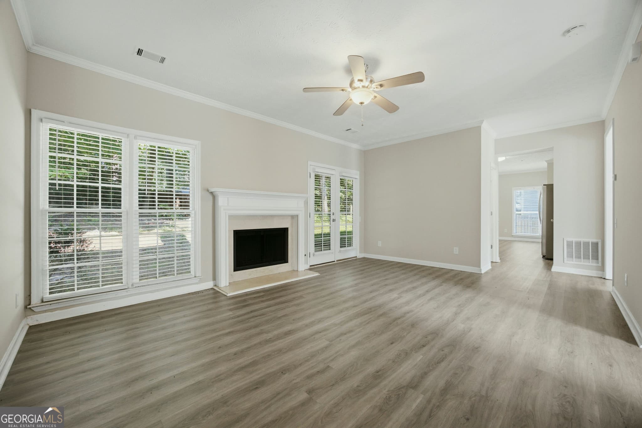 3 bedroom, 2.5 bathroom, 2,890 sq ft single family residence for sale at 10010 Feather Sound Court, Alpharetta, GA 30022 — photo 4