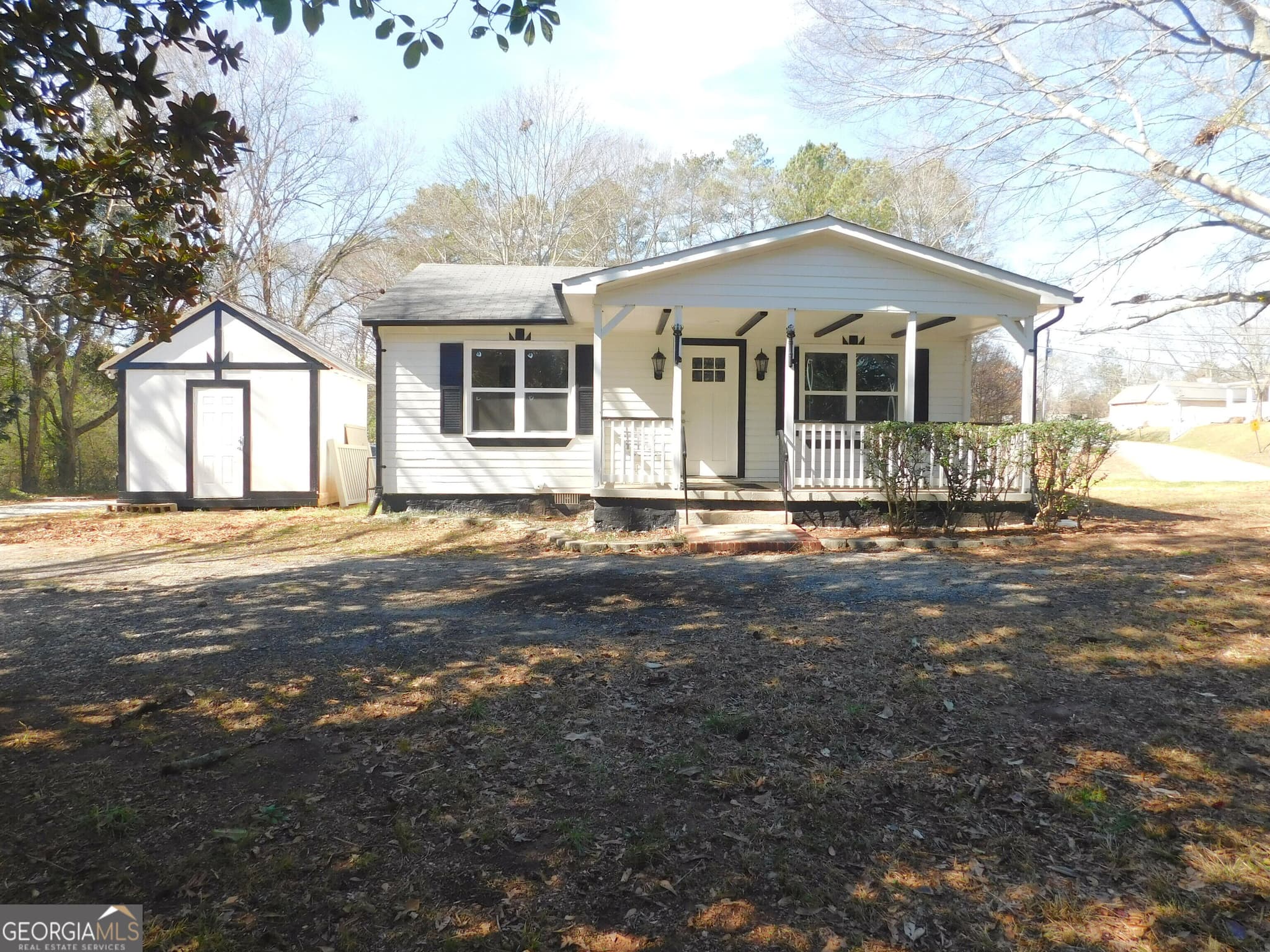 2 bedroom, 1.5 bathroom, 936 sq ft single family residence for sale at 2625 Rock Chapel Road, Lithonia, GA 30058 — photo 2