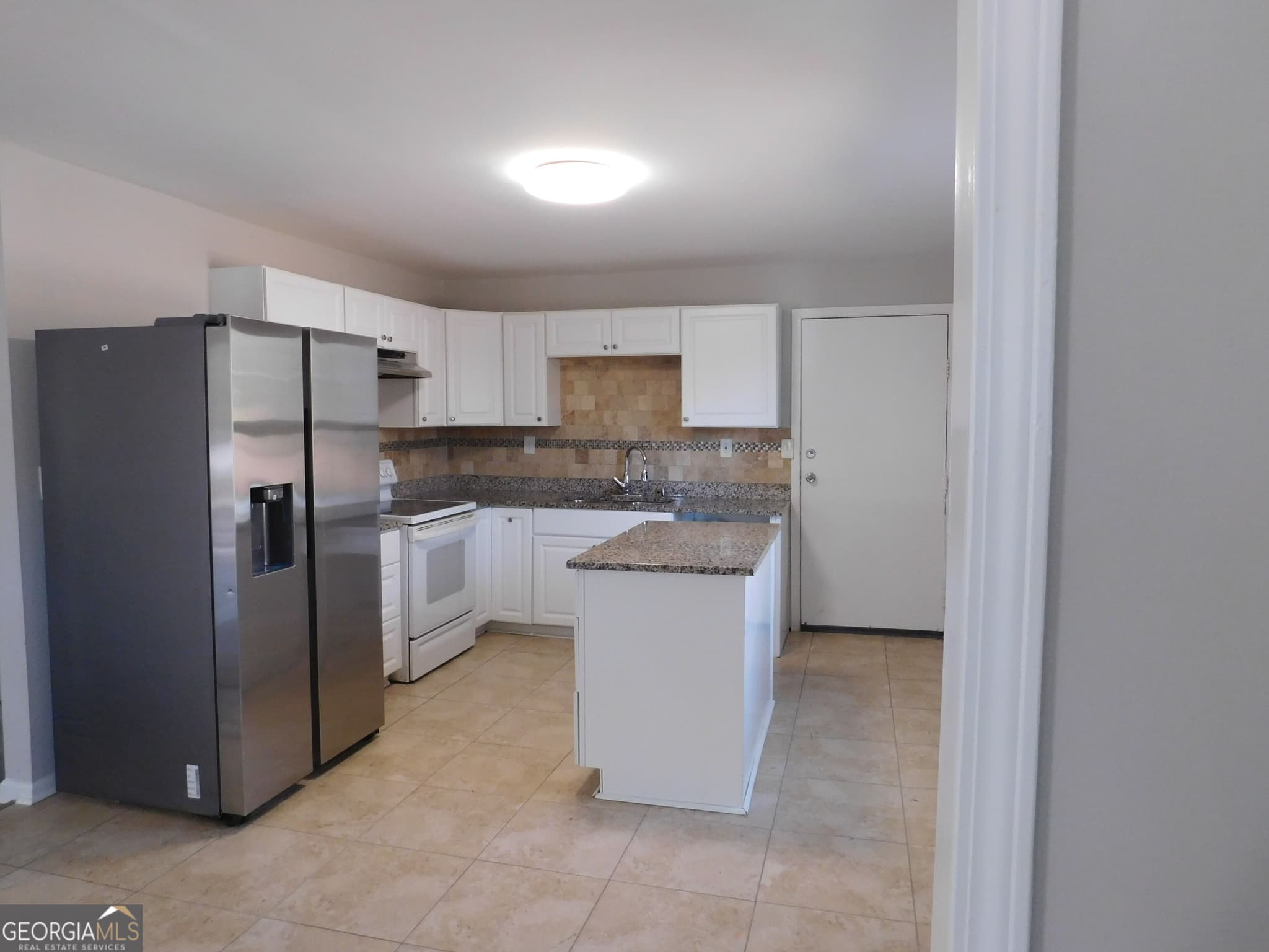 2 bedroom, 1.5 bathroom, 936 sq ft single family residence for sale at 2625 Rock Chapel Road, Lithonia, GA 30058 — photo 3