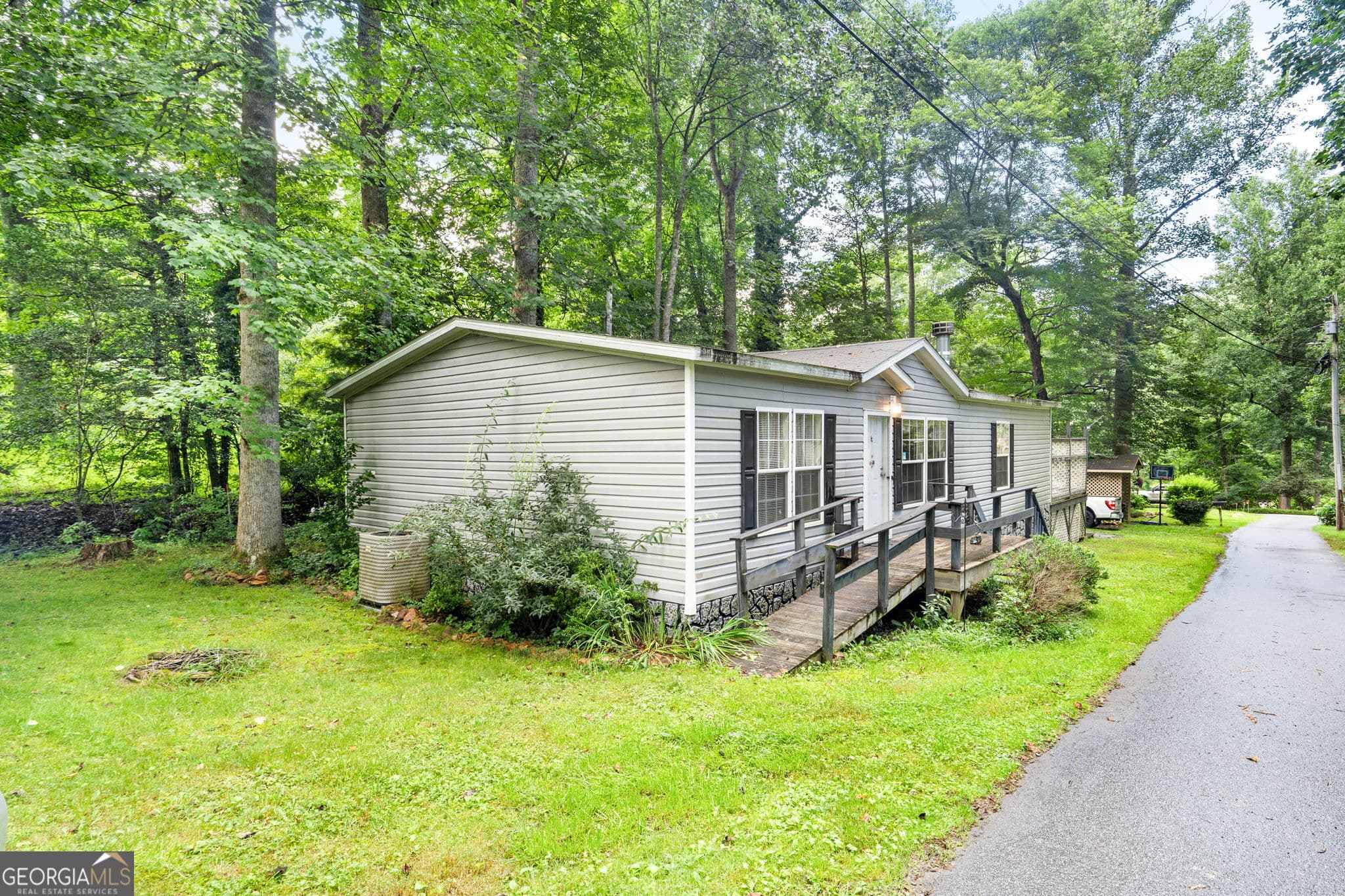 3 bedroom, 2 bathroom manufactured home,single family residence for sale at 108 Leisure Woods Lane, Hiawassee, GA 30546 — photo 2