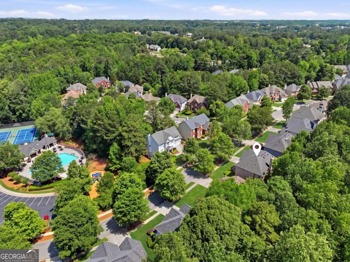 5 bedroom, 4 bathroom, 3,356 sq ft single family residence for sale at 4092 Suwanee Mill Drive, Buford, GA 30518 — photo 2