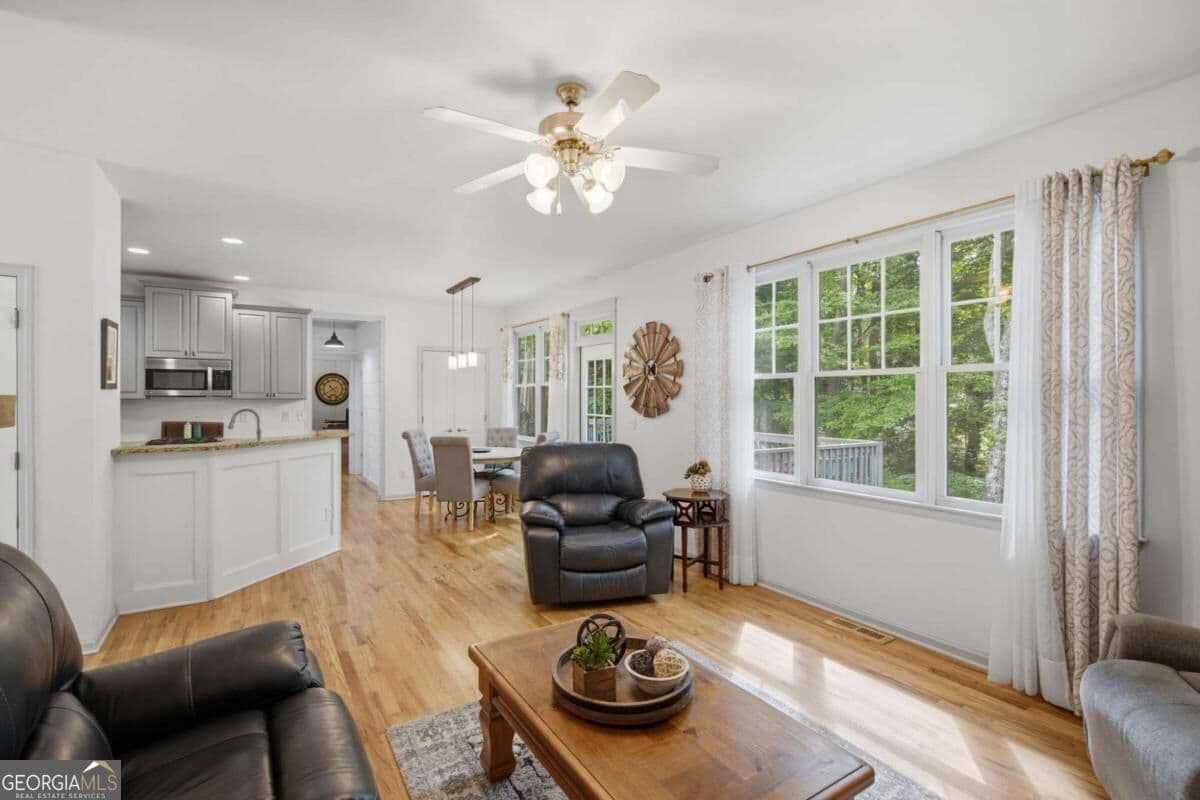 5 bedroom, 4 bathroom, 3,356 sq ft single family residence for sale at 4092 Suwanee Mill Drive, Buford, GA 30518 — photo 9