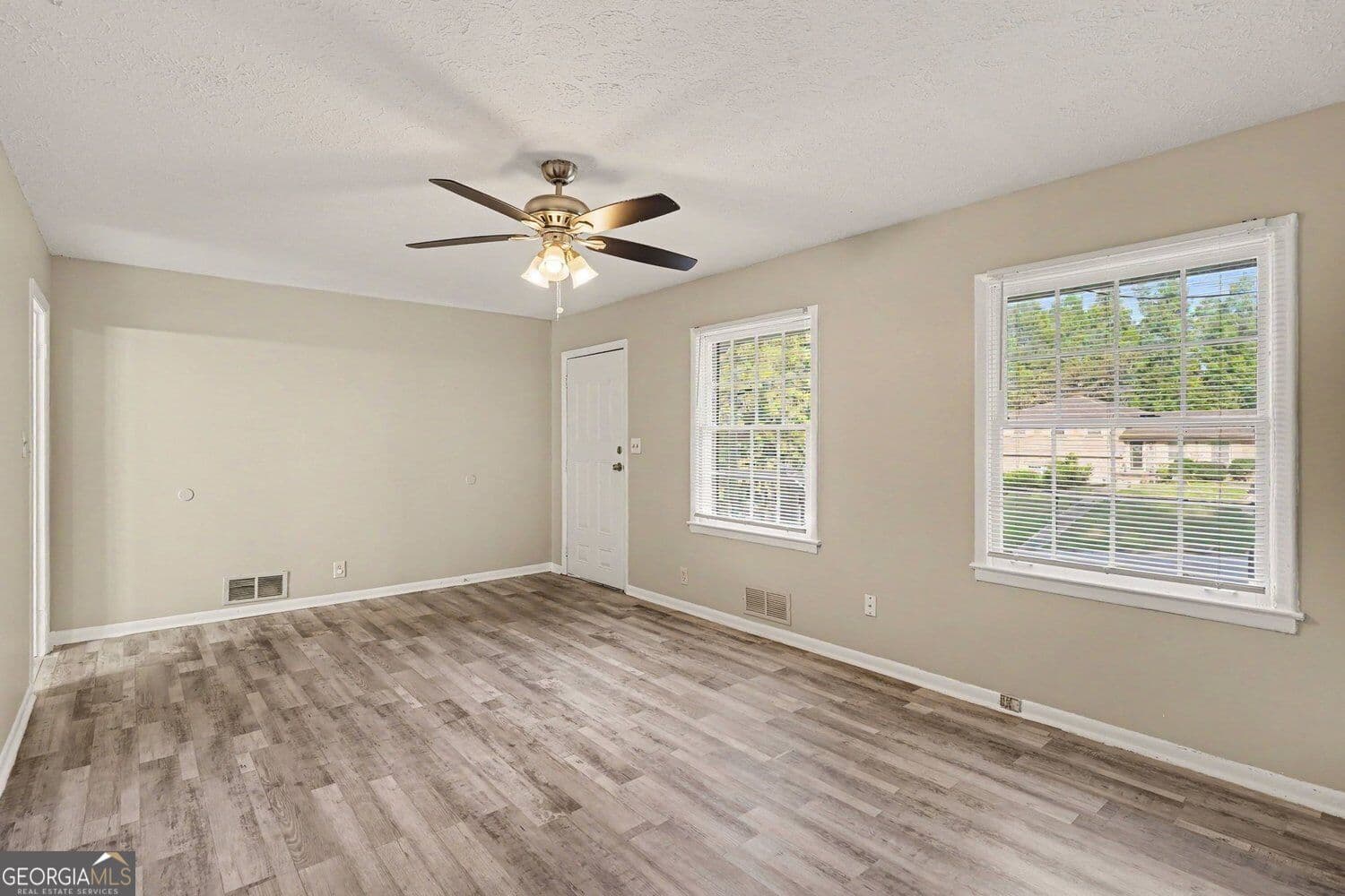 4 bedroom, 2.5 bathroom, 2,305 sq ft single family residence for sale at 4077 Rockey Valley Drive, Conley, GA 30288 — photo 5