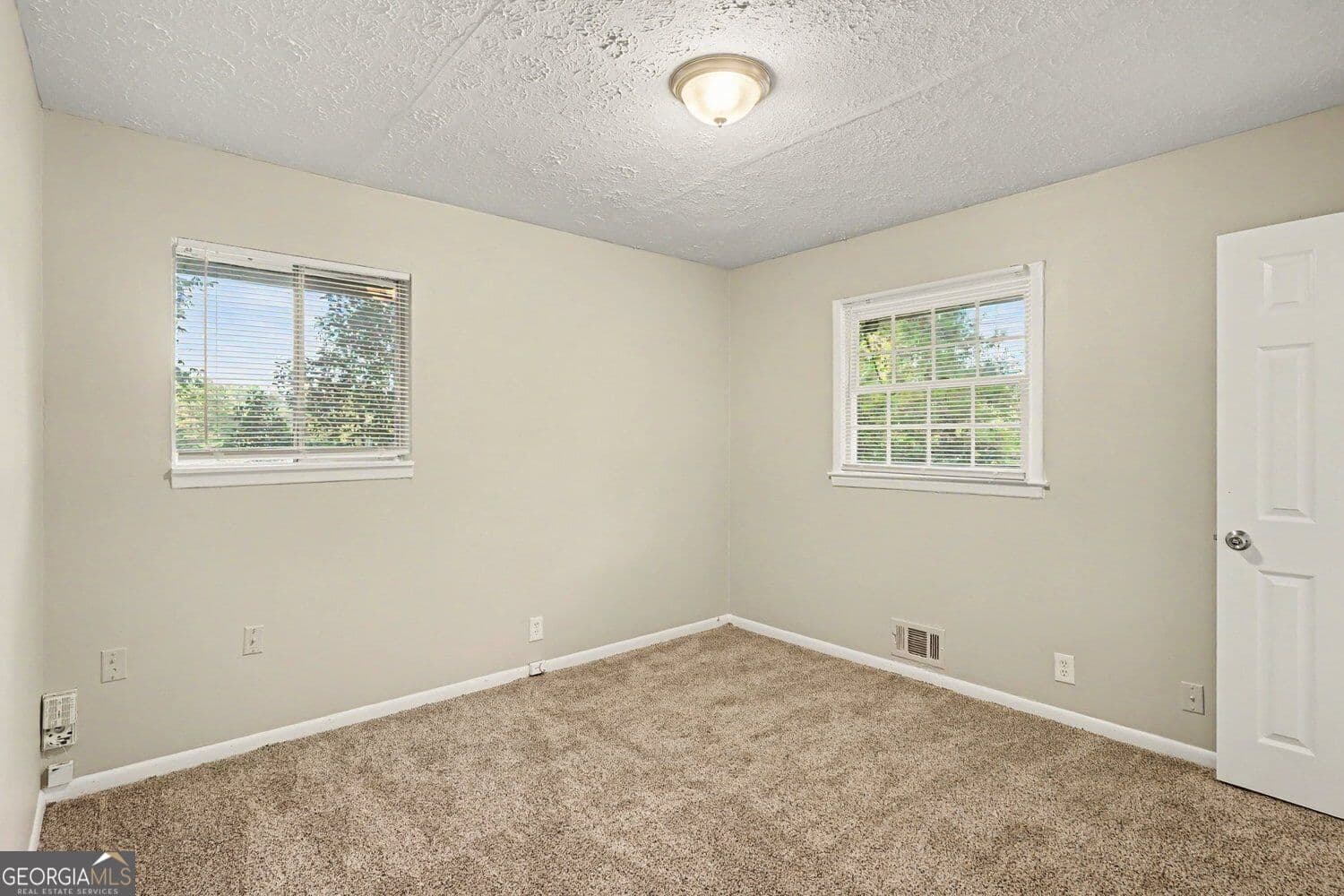 4 bedroom, 2.5 bathroom, 2,305 sq ft single family residence for sale at 4077 Rockey Valley Drive, Conley, GA 30288 — photo 10