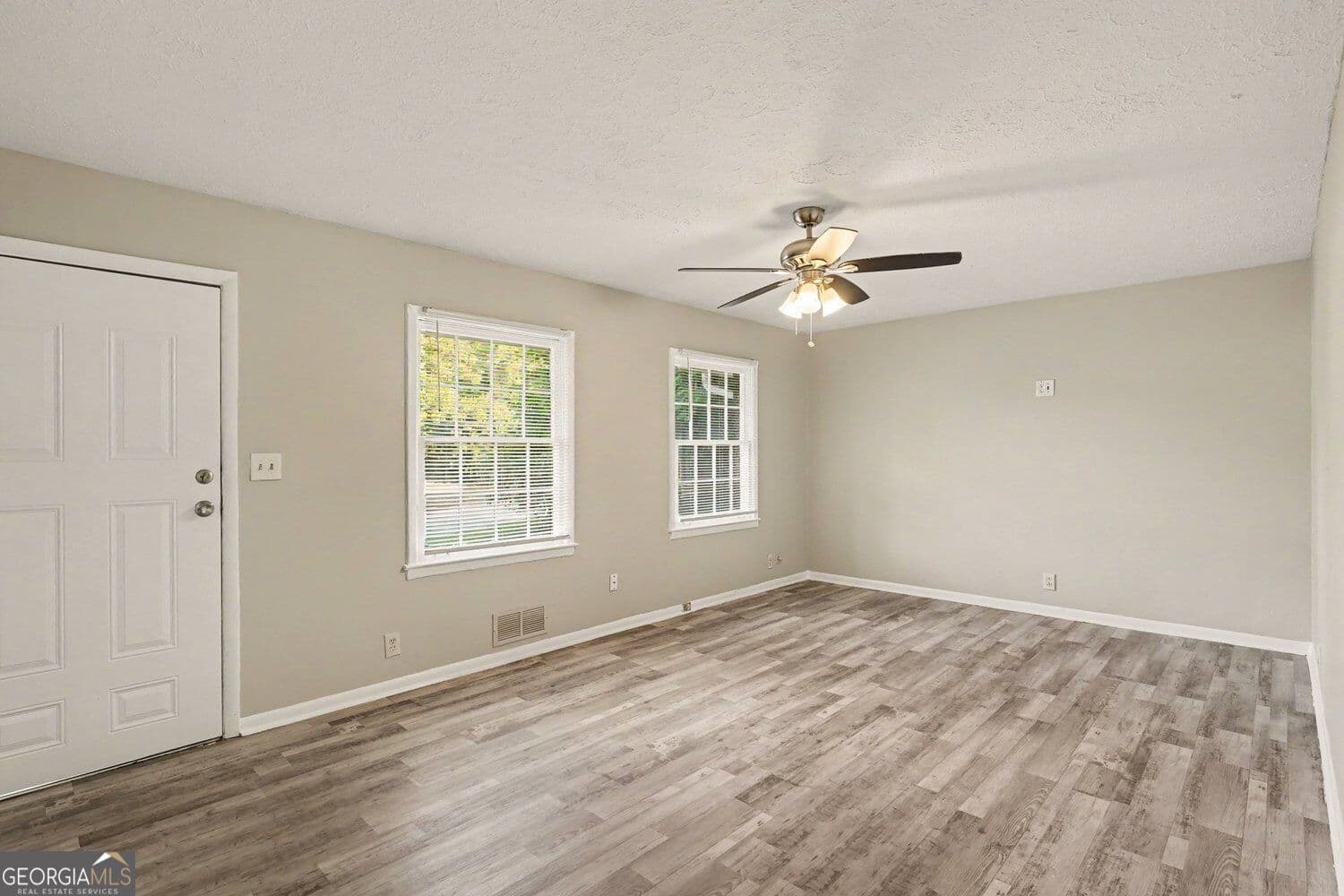 4 bedroom, 2.5 bathroom, 2,305 sq ft single family residence for sale at 4077 Rockey Valley Drive, Conley, GA 30288 — photo 4
