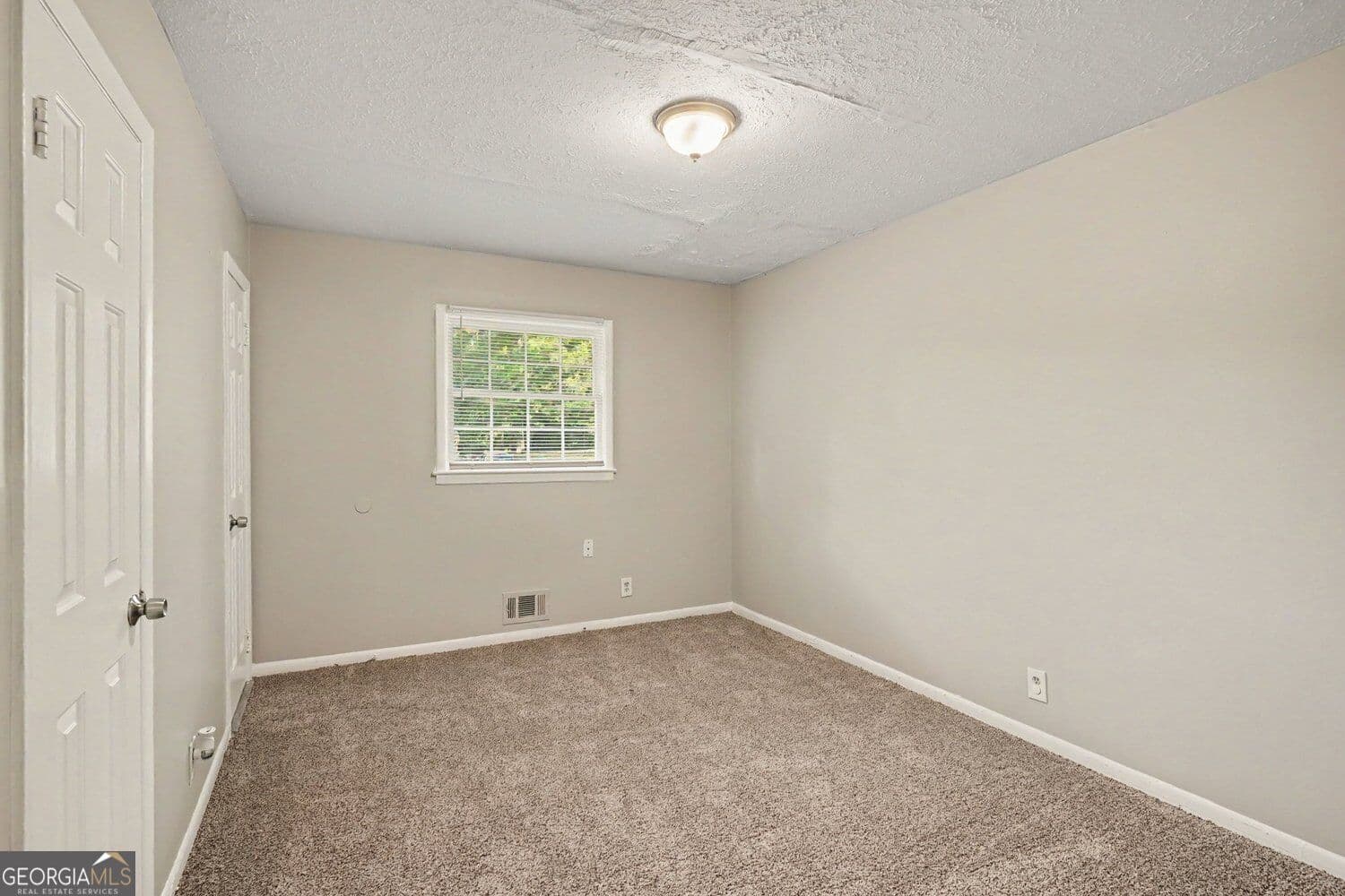 4 bedroom, 2.5 bathroom, 2,305 sq ft single family residence for sale at 4077 Rockey Valley Drive, Conley, GA 30288 — photo 8
