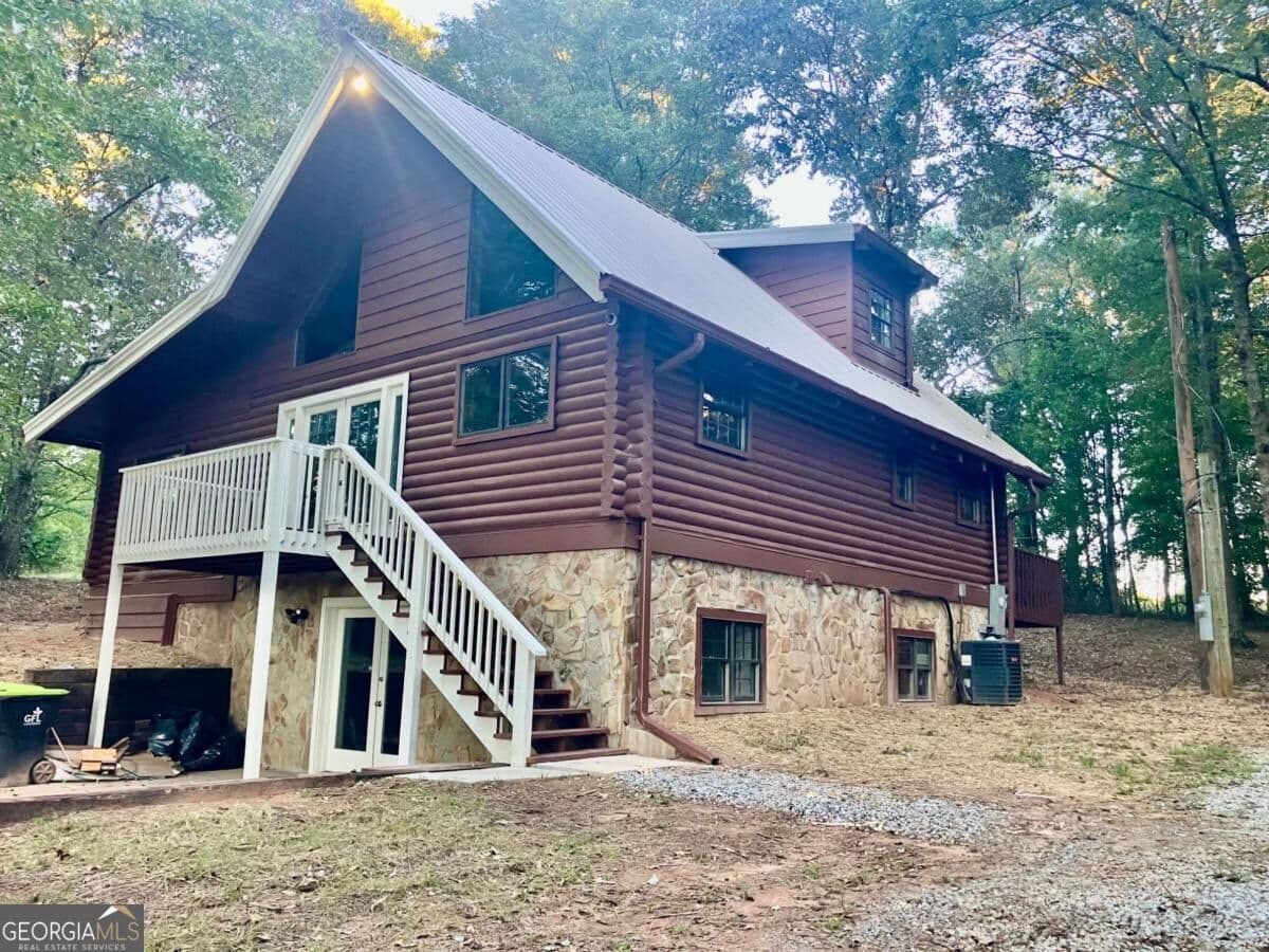 3 bedroom, 3 bathroom, 992 sq ft cabin,single family residence for sale at 9090 Wilkerson Mill Road, Palmetto, GA 30268 — photo 2