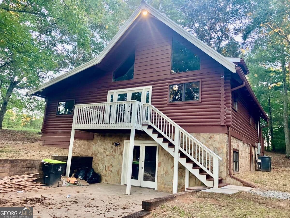 3 bedroom, 3 bathroom, 992 sq ft cabin,single family residence for sale at 9090 Wilkerson Mill Road, Palmetto, GA 30268 — photo 1 of 55