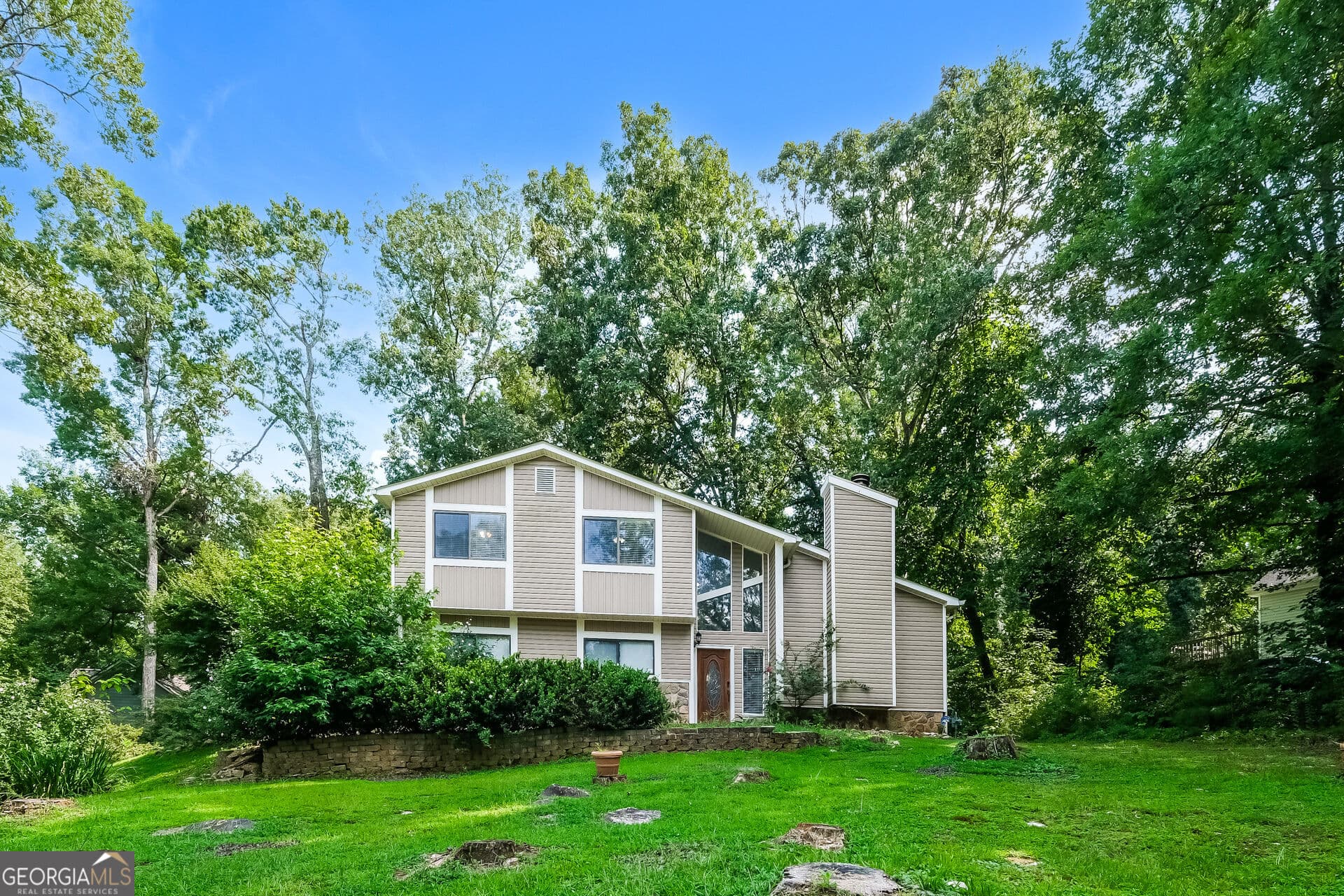 4 bedroom, 2.5 bathroom, 1,908 sq ft single family residence for sale at 6629 Windwood Circle, Douglasville, GA 30135 — photo 1 of 22