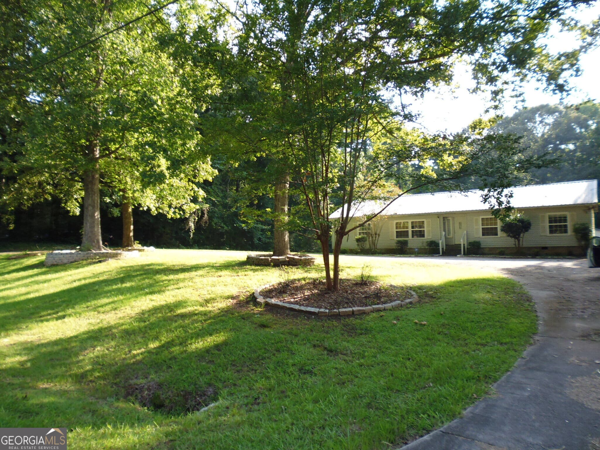4 bedroom, 3 bathroom, 1,820 sq ft single family residence for sale at 1217 Vaughn Road, Griffin, GA 30223 — photo 2