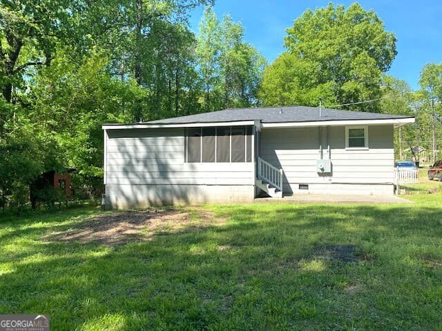 3 bedroom, 2 bathroom, 1,150 sq ft single family residence for sale at 407 Highway 314, Fayetteville, GA 30214 — photo 2