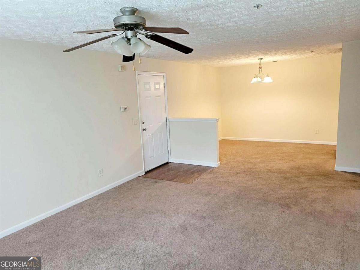 3 bedroom, 2 bathroom, 1,232 sq ft condominium for sale at 3303 Fairington Club Drive 3303, Lithonia, GA 30038 — photo 3