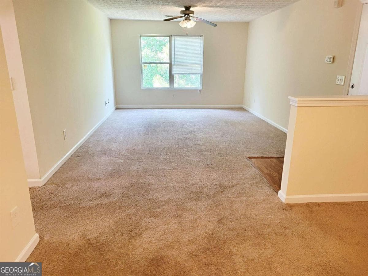 3 bedroom, 2 bathroom, 1,232 sq ft condominium for sale at 3303 Fairington Club Drive 3303, Lithonia, GA 30038 — photo 5