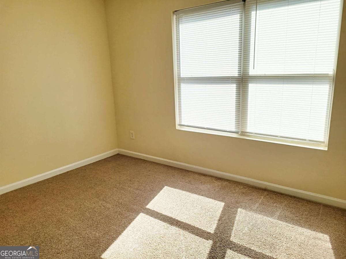 3 bedroom, 2 bathroom, 1,232 sq ft condominium for sale at 3303 Fairington Club Drive 3303, Lithonia, GA 30038 — photo 10