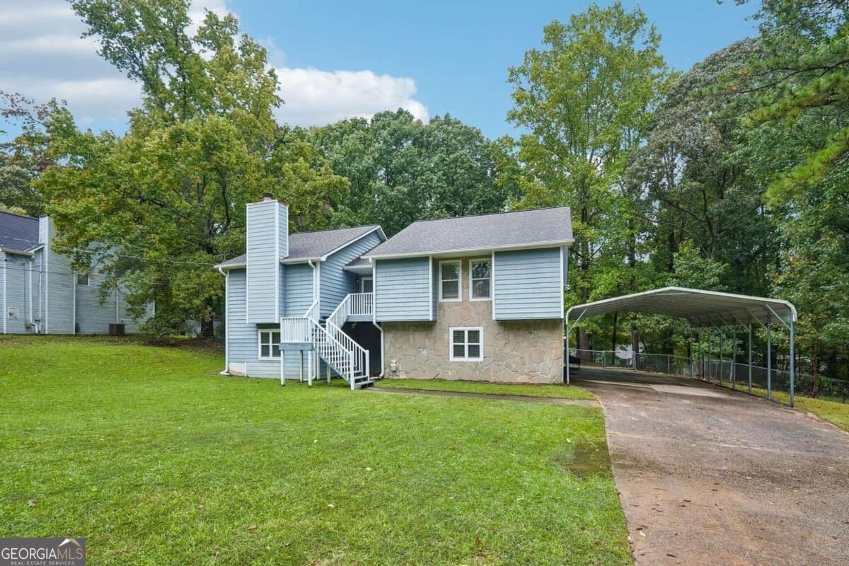 4 bedroom, 3 bathroom, 3,312 sq ft single family residence for sale at 3699 Bomar Road, Douglasville, GA 30135 — photo 1 of 41