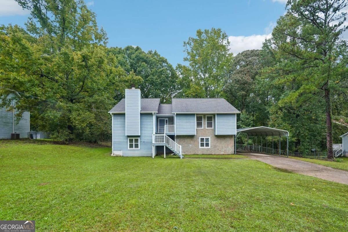 4 bedroom, 3 bathroom, 3,312 sq ft single family residence for sale at 3699 Bomar Road, Douglasville, GA 30135 — photo 4