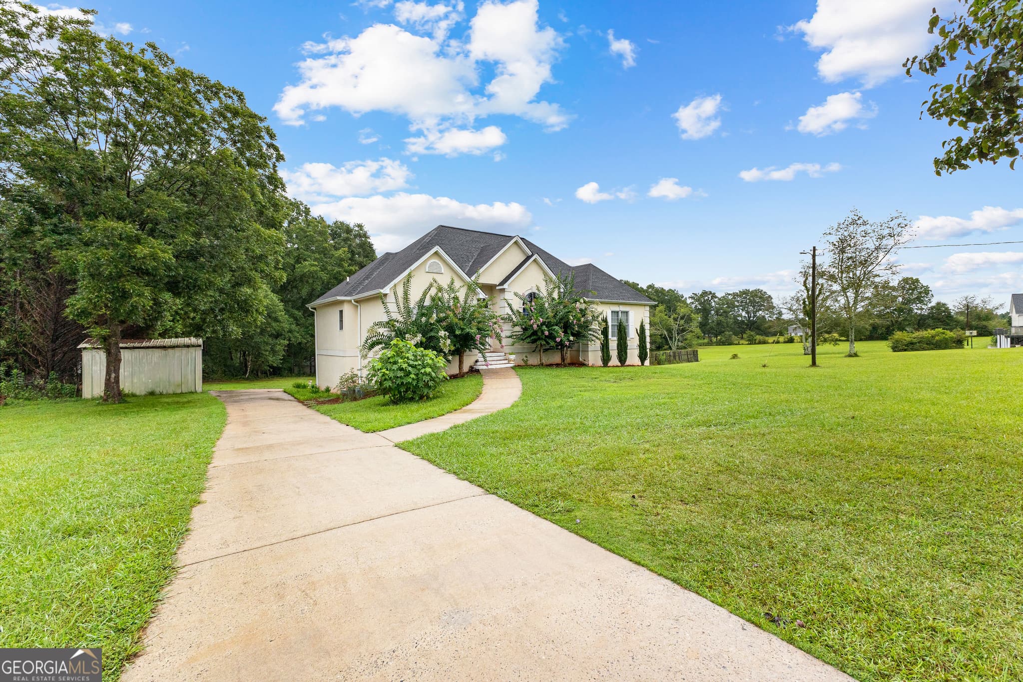 4 bedroom, 3.5 bathroom, 3,632 sq ft single family residence for sale at 502 N Rover Road, Williamson, GA 30292 — photo 2