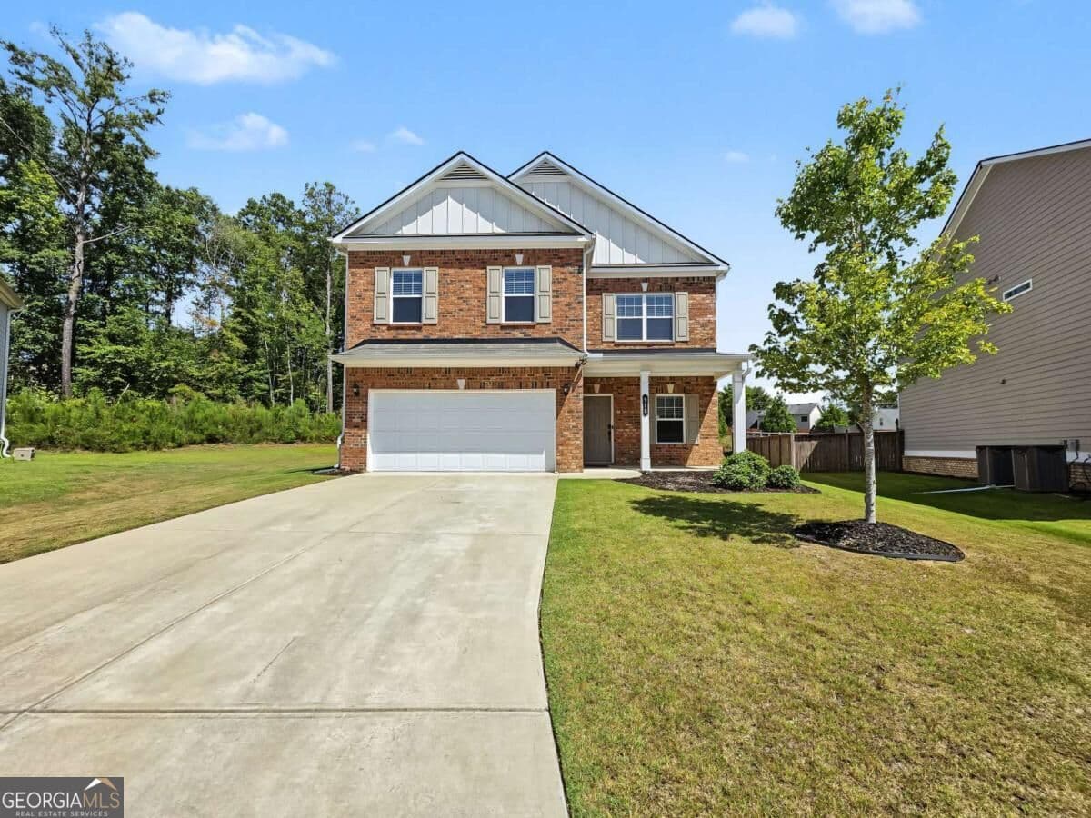 4 bedroom, 2.5 bathroom, 2,565 sq ft single family residence for sale at 918 Brittfield Way, Loganville, GA 30052 — photo 1 of 34