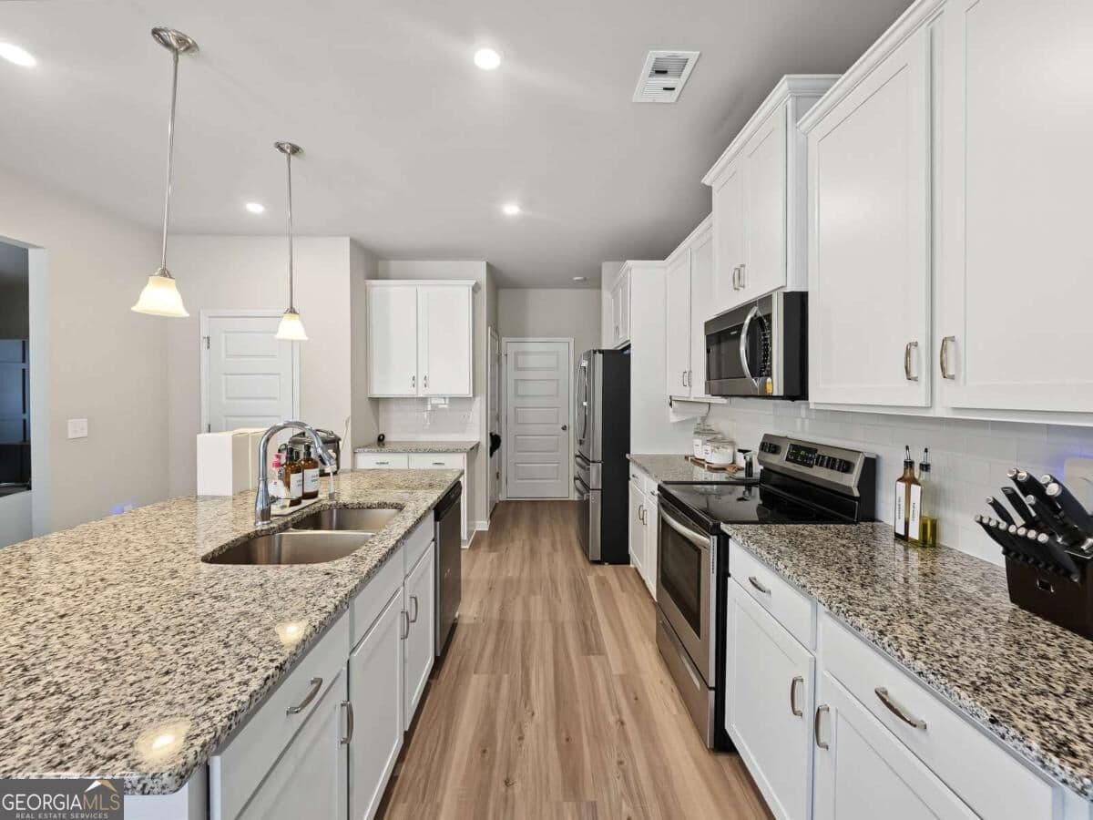 4 bedroom, 2.5 bathroom, 2,565 sq ft single family residence for sale at 918 Brittfield Way, Loganville, GA 30052 — photo 10
