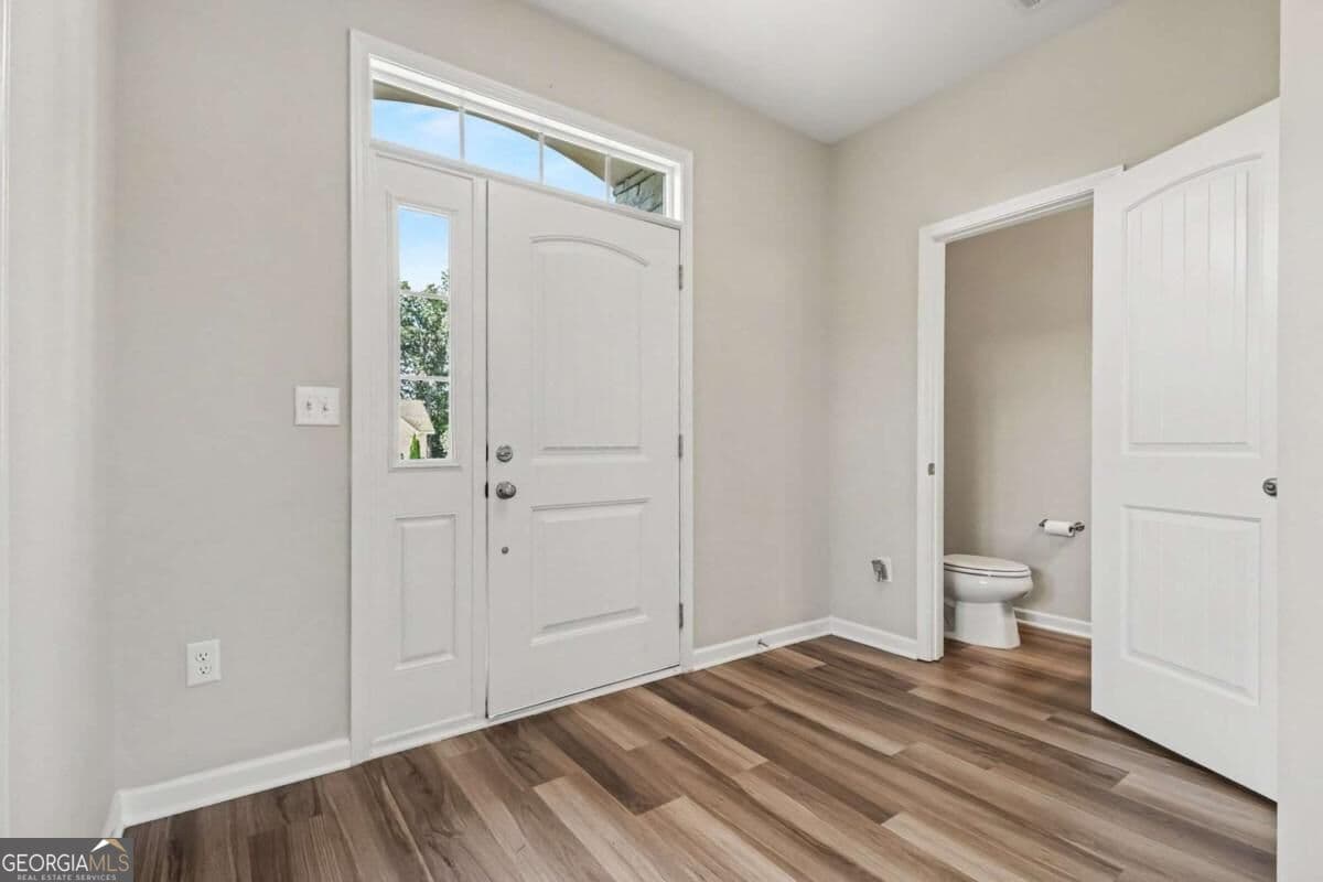 4 bedroom, 3.5 bathroom, 3,142 sq ft single family residence for sale at 8110 Tavern Road, Ball Ground, GA 30107 — photo 7