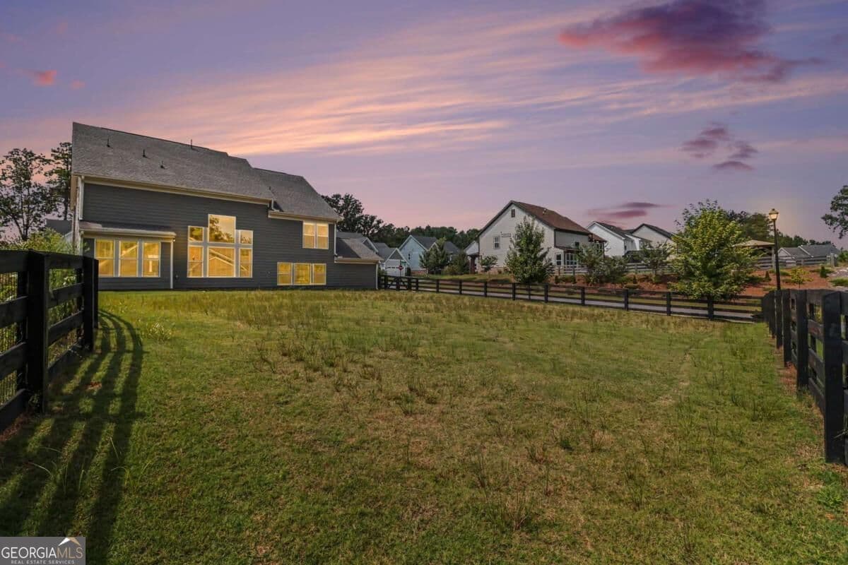 4 bedroom, 3.5 bathroom, 3,142 sq ft single family residence for sale at 8110 Tavern Road, Ball Ground, GA 30107 — photo 3