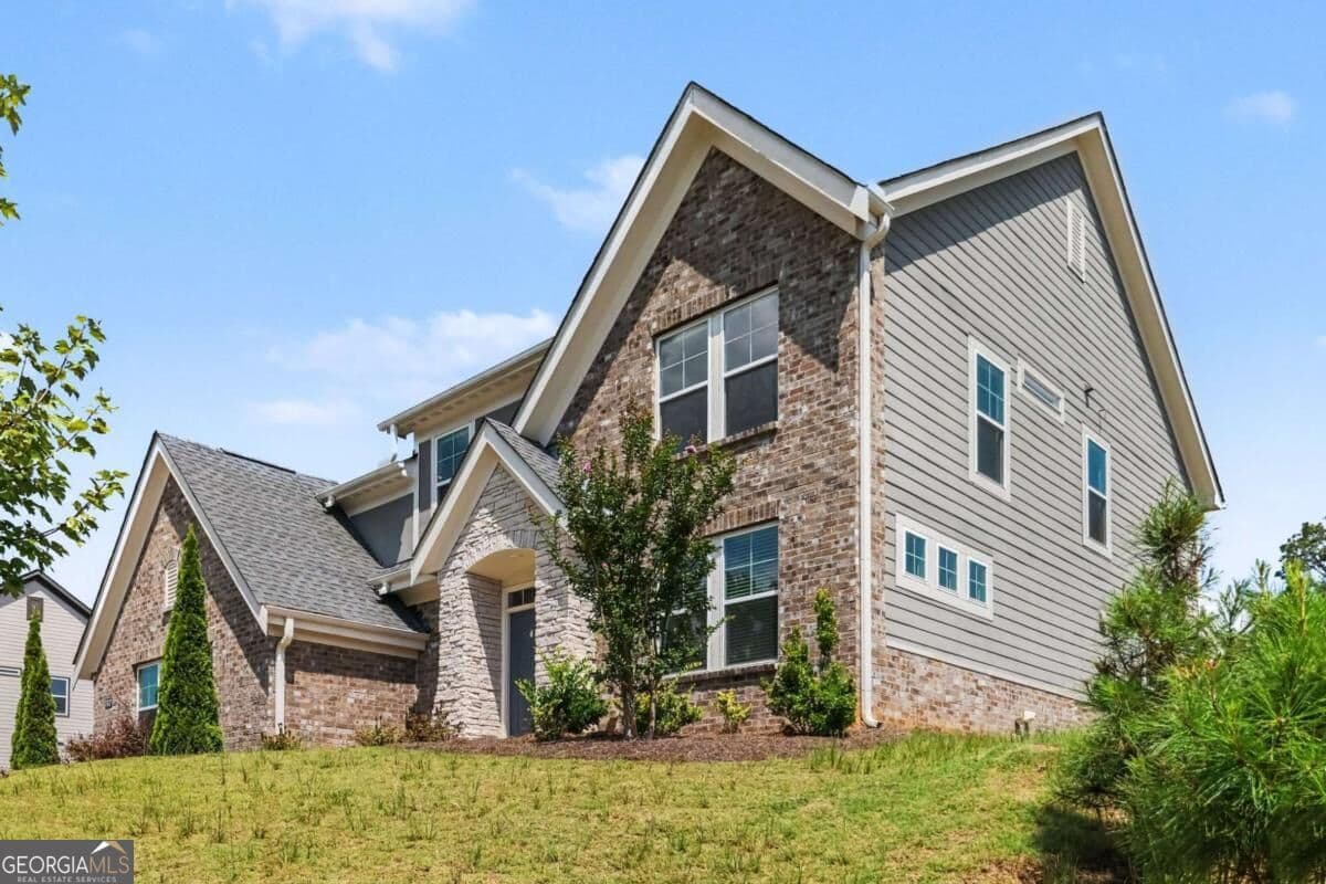 4 bedroom, 3.5 bathroom, 3,142 sq ft single family residence for sale at 8110 Tavern Road, Ball Ground, GA 30107 — photo 5