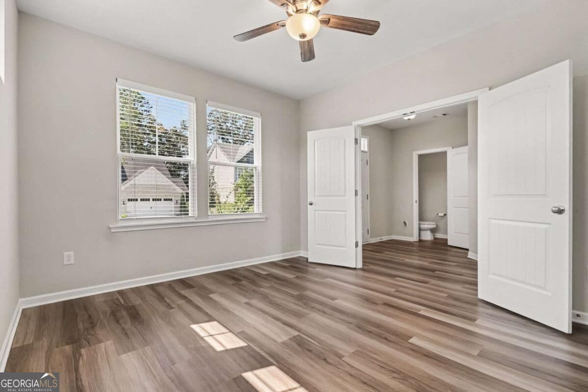 4 bedroom, 3.5 bathroom, 3,142 sq ft single family residence for sale at 8110 Tavern Road, Ball Ground, GA 30107 — photo 10