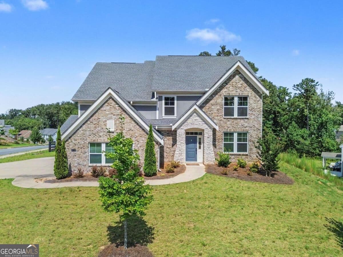 4 bedroom, 3.5 bathroom, 3,142 sq ft single family residence for sale at 8110 Tavern Road, Ball Ground, GA 30107 — photo 4