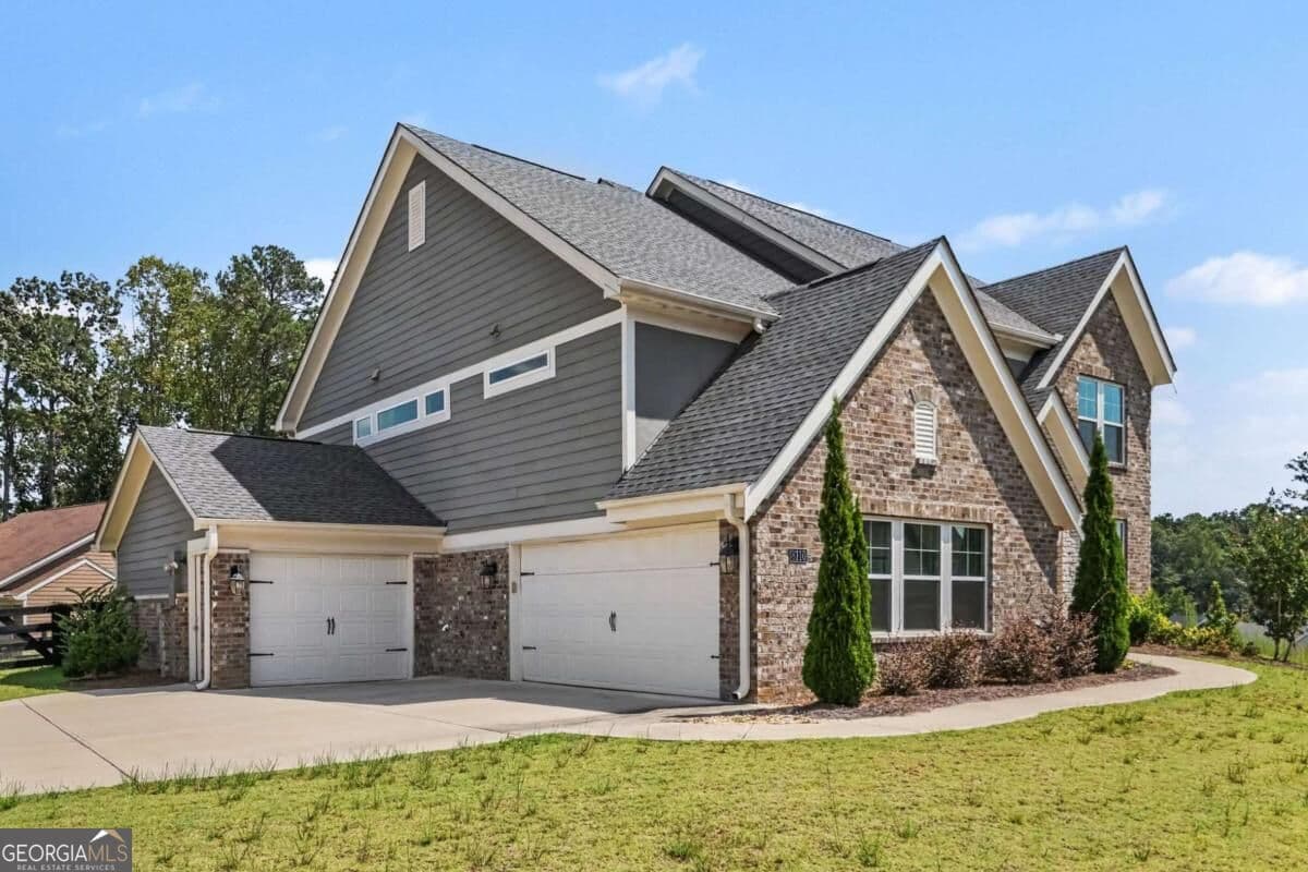 4 bedroom, 3.5 bathroom, 3,142 sq ft single family residence for sale at 8110 Tavern Road, Ball Ground, GA 30107 — photo 8