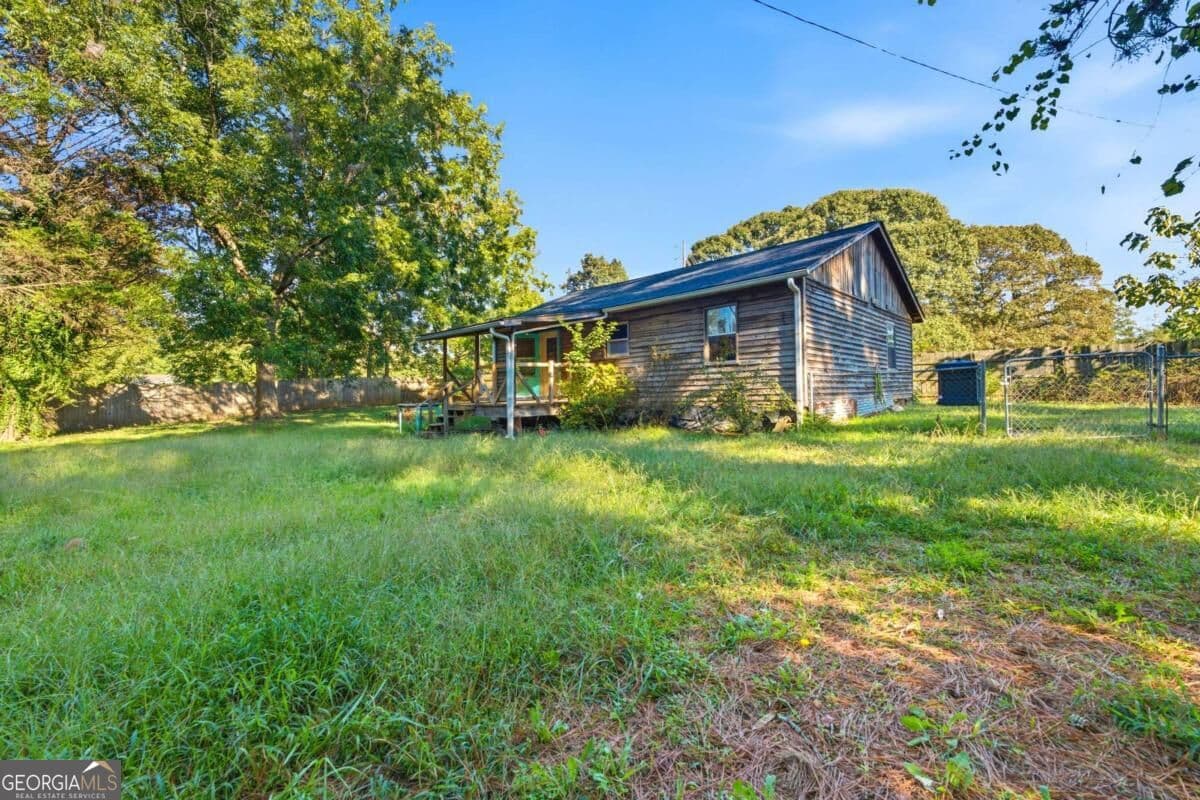 2 bedroom, 2 bathroom, 1,196 sq ft single family residence for sale at 1689 King Mill Road, Mcdonough, GA 30252 — photo 2