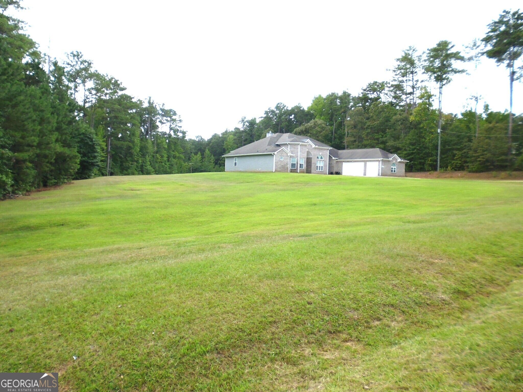 3 bedroom, 3.5 bathroom, 3,652 sq ft single family residence for sale at 1800 W Ellis Road, Griffin, GA 30223 — photo 2