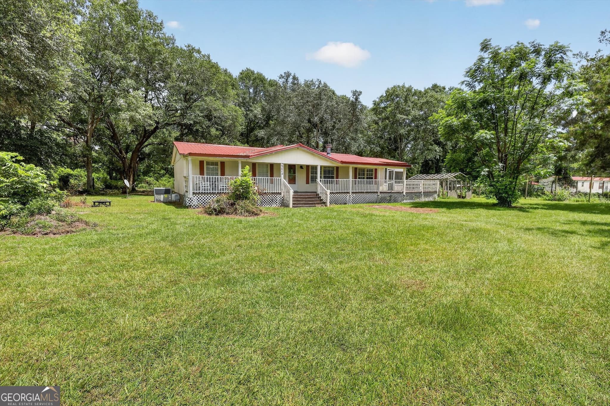 4 bedroom, 2 bathroom, 1,560 sq ft manufactured home,single family residence for sale at 2224 Howard Alexander Road, Collins, GA 30421 — photo 3