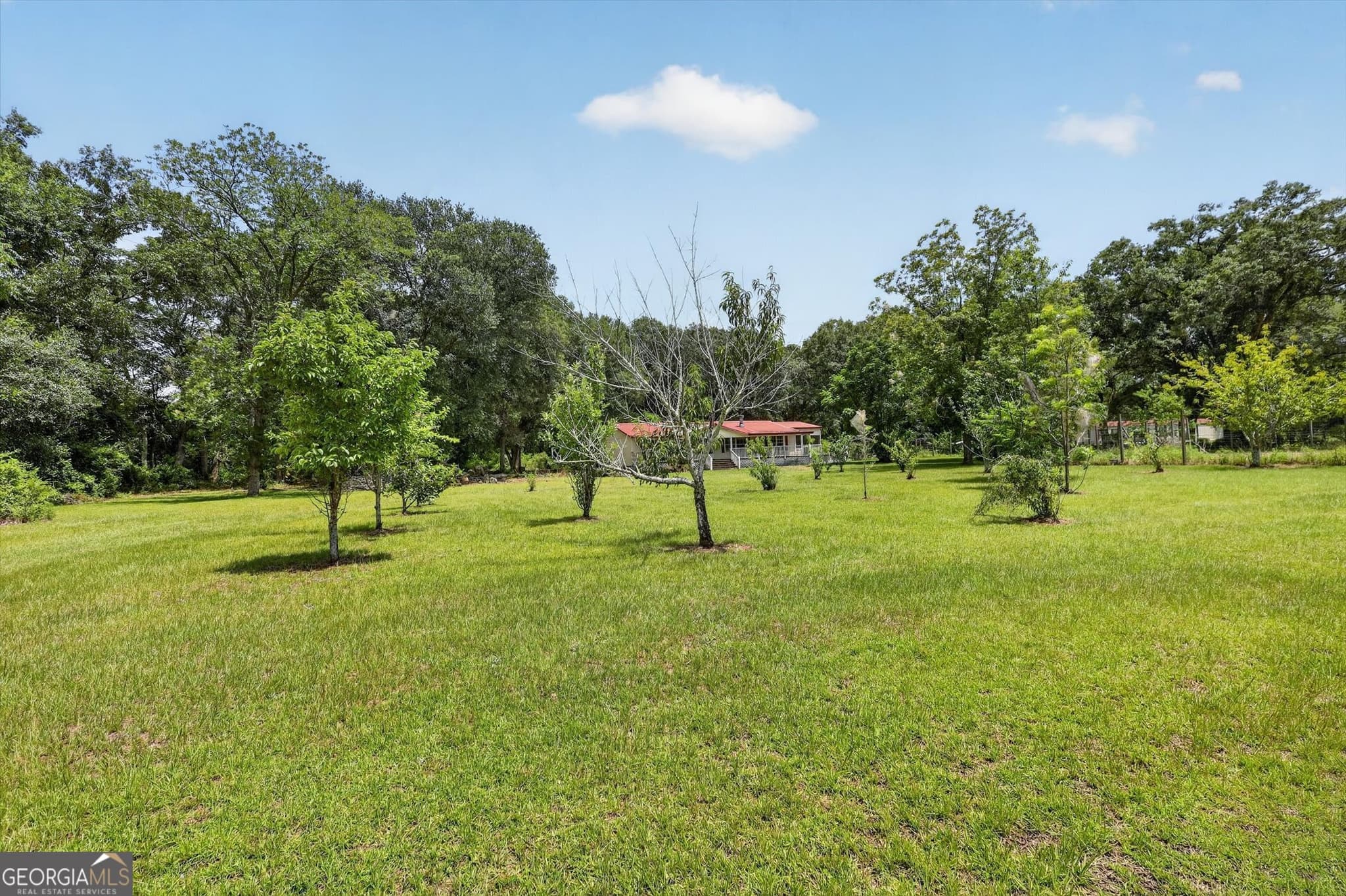 4 bedroom, 2 bathroom, 1,560 sq ft manufactured home,single family residence for sale at 2224 Howard Alexander Road, Collins, GA 30421 — photo 4