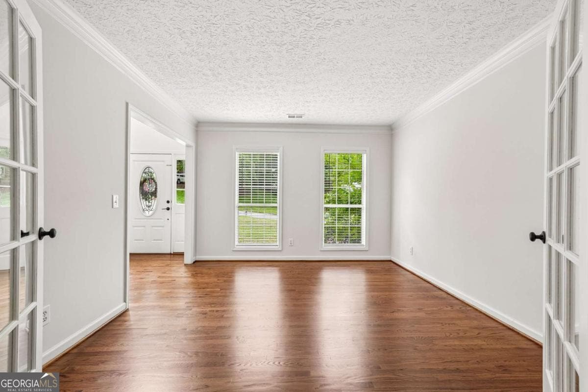 4 bedroom, 2.5 bathroom, 4,000 sq ft single family residence for sale at 5520 Tallantworth Trail, Cumming, GA 30040 — photo 3