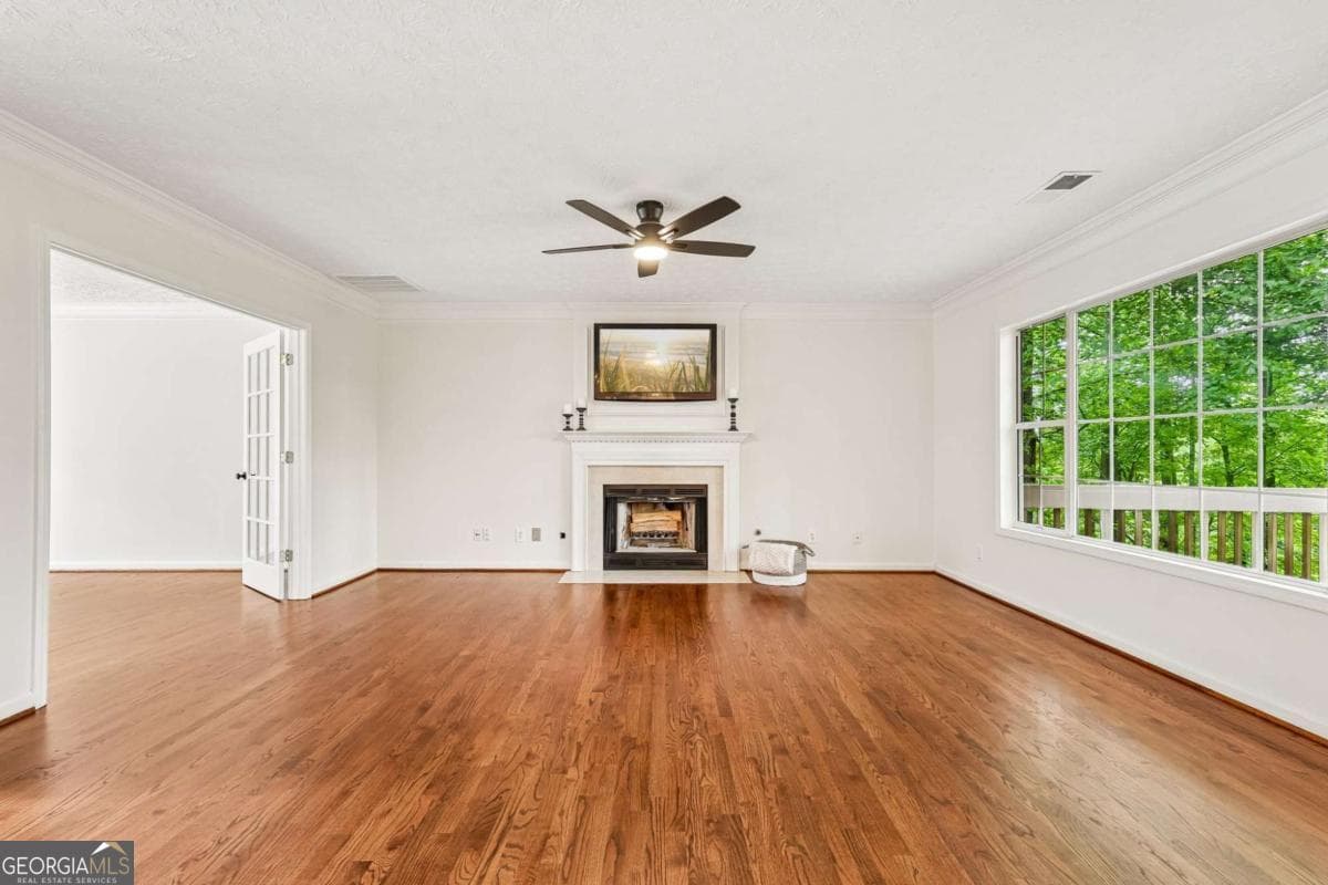 4 bedroom, 2.5 bathroom, 4,000 sq ft single family residence for sale at 5520 Tallantworth Trail, Cumming, GA 30040 — photo 5