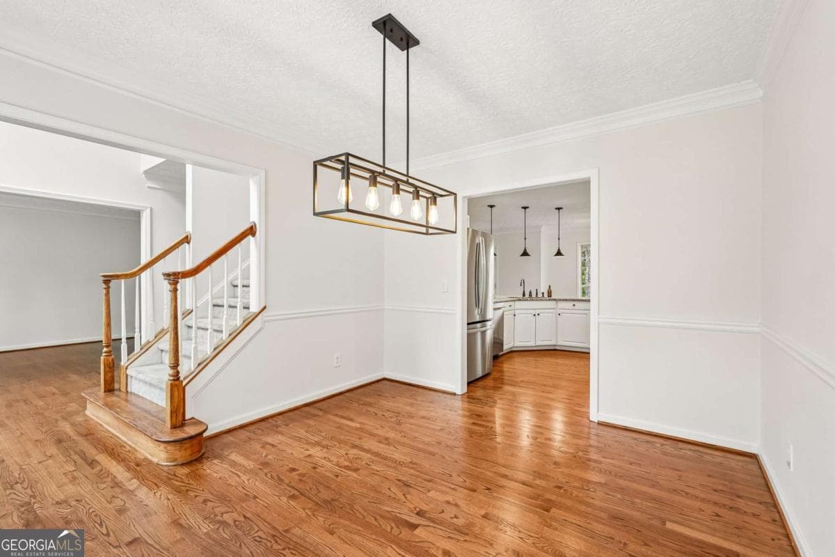 4 bedroom, 2.5 bathroom, 4,000 sq ft single family residence for sale at 5520 Tallantworth Trail, Cumming, GA 30040 — photo 10