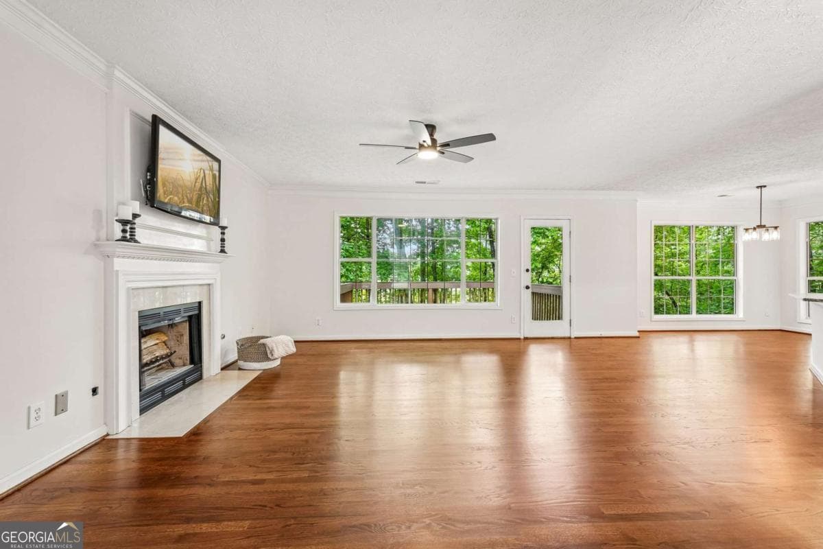 4 bedroom, 2.5 bathroom, 4,000 sq ft single family residence for sale at 5520 Tallantworth Trail, Cumming, GA 30040 — photo 4