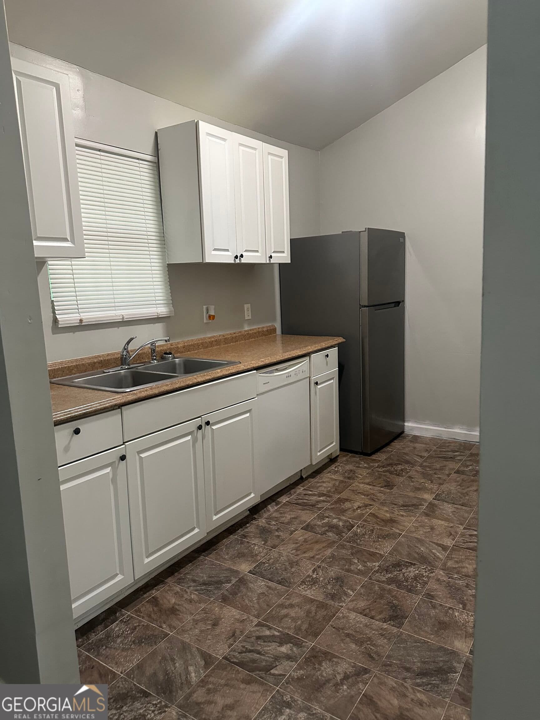 3 bedroom, 2 bathroom, 1,224 sq ft single family residence for sale at 3264 Brisbane Way, Lithonia, GA 30038 — photo 4