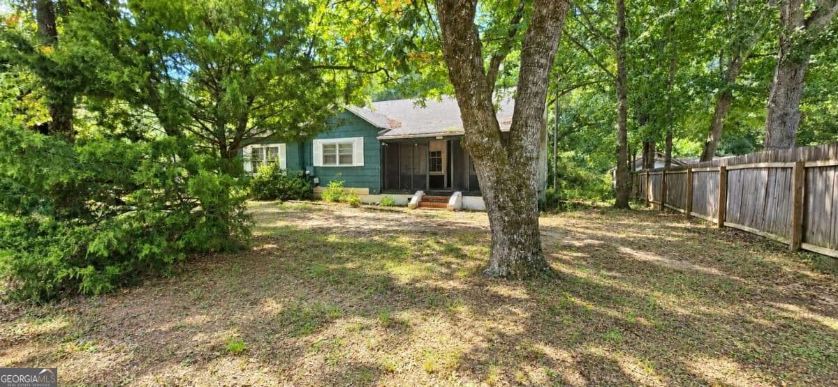 3 bedroom, 2 bathroom, 1,238 sq ft single family residence for sale at 6102 Petty Street, Covington, GA 30014 — photo 2
