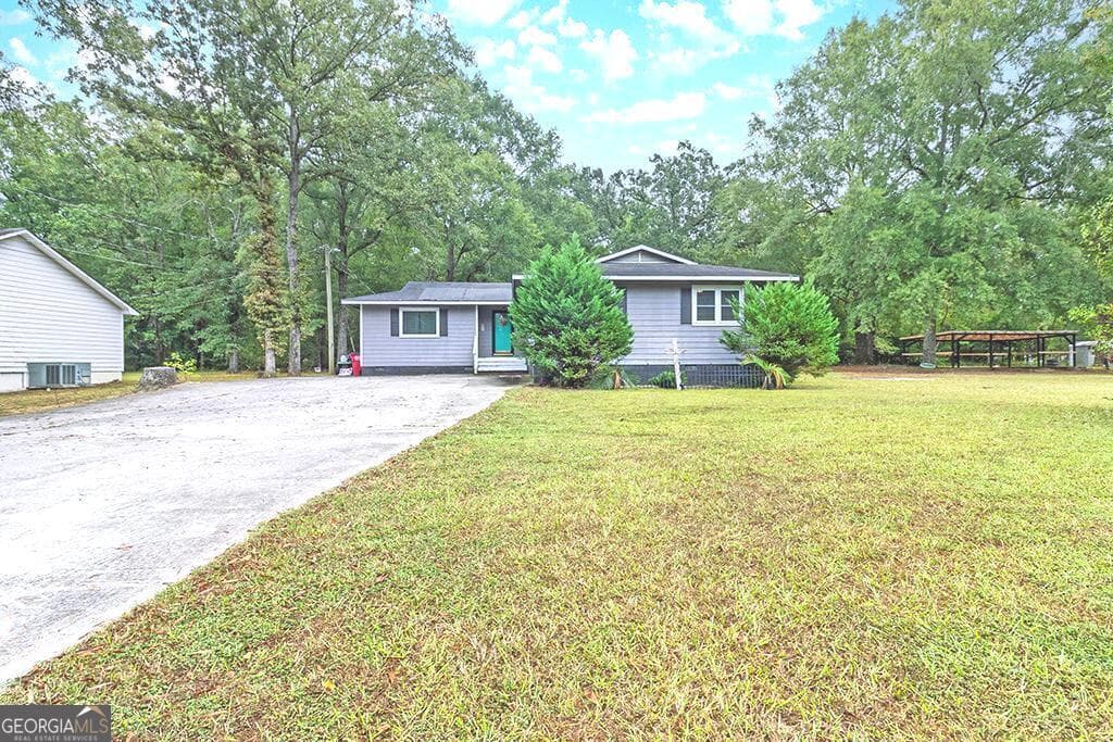 4 bedroom, 2 bathroom, 1,803 sq ft single family residence for sale at 518 Cooley Drive, Sandersville, GA 31082 — photo 2
