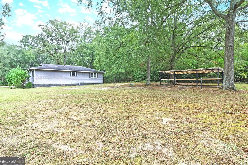 4 bedroom, 2 bathroom, 1,803 sq ft single family residence for sale at 518 Cooley Drive, Sandersville, GA 31082 — photo 9